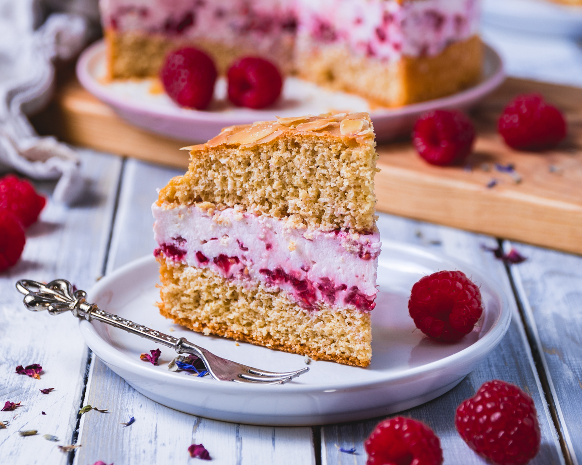 healthy bee sting cake with raspberries and cream